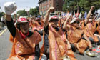 Unionised construction workers chant slogans during their general strike rally in Seoul